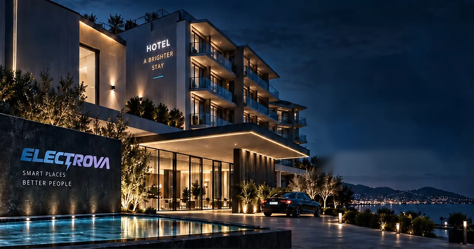 Hotel modern natën, me ndriçim dhe sisteme të integruara